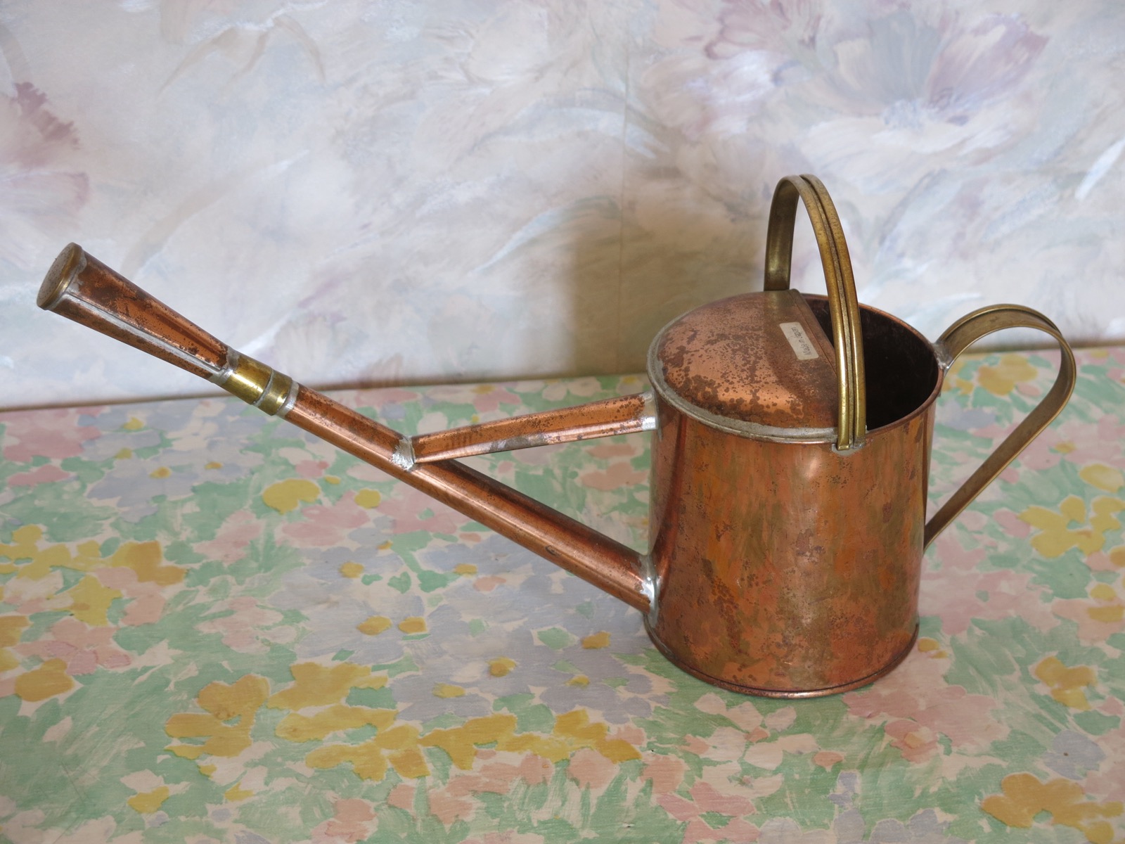 A copper watering can made for bonsai use